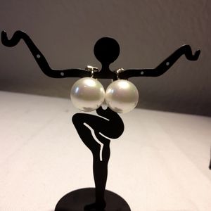 Majorica pearl clip on earrings. Stamped 925